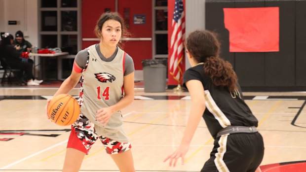 xp Ari Long maneuvers vs opposing player Valley View Moreno Valley girls basketball photo by John Murphy Jan 16 2023